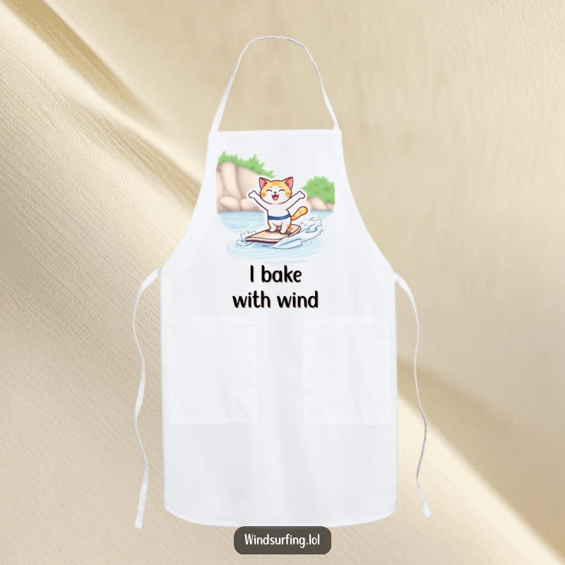 Funny apron featuring a joyful cat windsurfing with arms out, ready for kitchen adventures, a humorous cooking accessory.