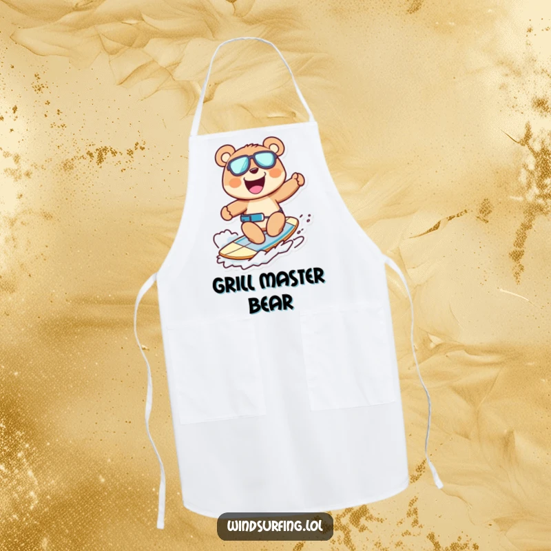 Funny apron featuring a cheerful bear windsurfing with a wide grin, ready for kitchen adventures, a humorous cooking accessory.