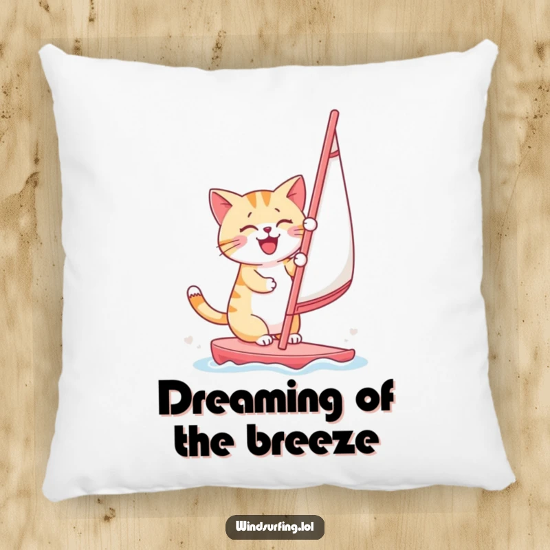 Soft decorative pillow with a funny illustration of a happy cat windsurfing, bringing coastal charm.
