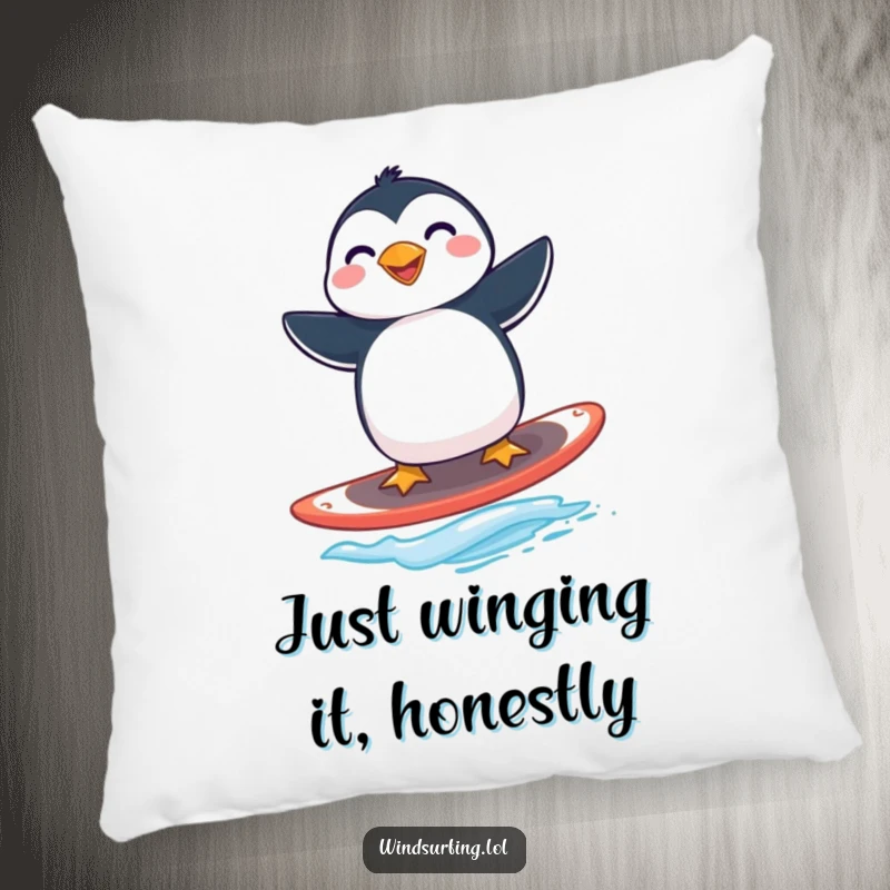 Funny penguin windsurfing pillow depicting a grinning penguin skillfully balancing on a windsurfing board.