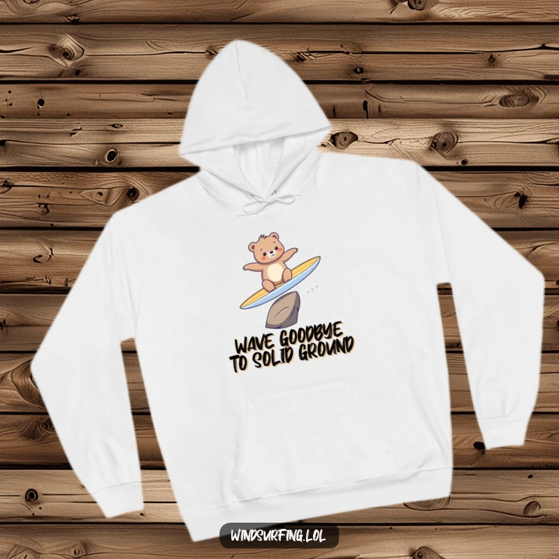Funny hoodie depicting a bear hilariously wiping out on a surfboard, conveying pure, unadulterated amusement and a sense of adventure.