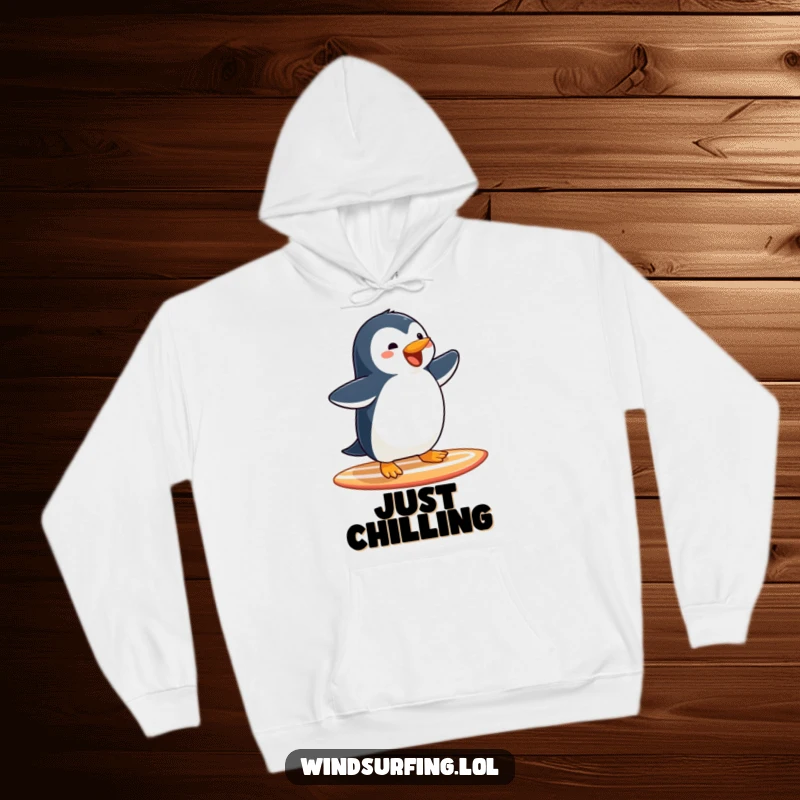 Funny Penguin Surfing Hoodie: A joyful penguin surfs with arms outstretched, embodying pure surfing delight.