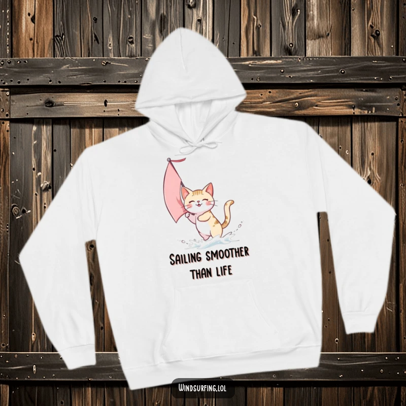 Funny hoodie featuring a cat joyfully sailing with a sail catching a strong wind, embodying freedom and playful adventure.