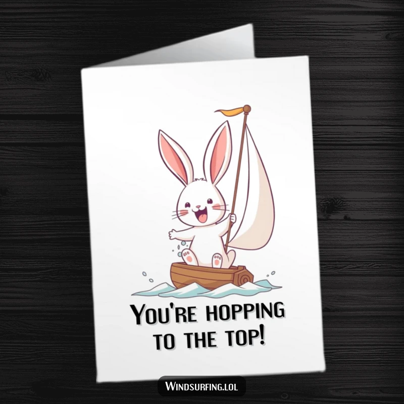 Funny Free Printable Bunny Sailing Congratulations Card: A determined bunny wrestles with a large sail, celebrating a hard-won victory.