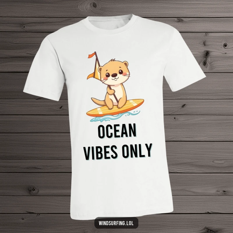 Funny t-shirt depicting a cheerful otter skillfully surfing on a board with a sail, enjoying the sea.