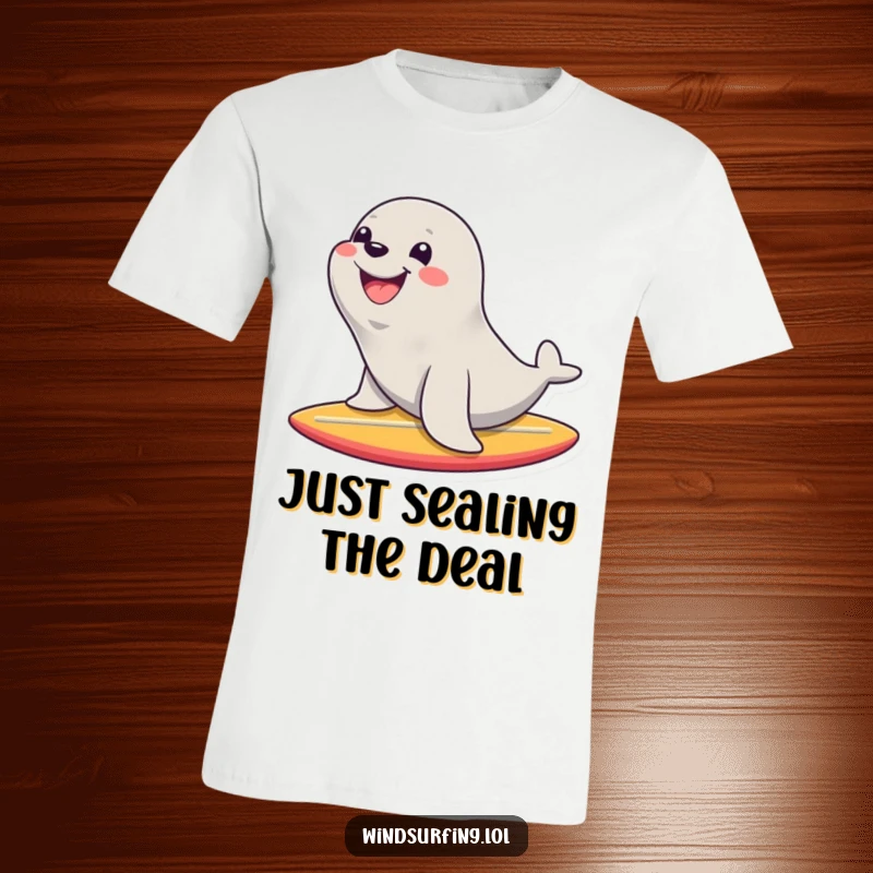 Funny t-shirt depicting a happy seal with a huge grin, confidently riding a surfboard, showcasing a love for surfing and sea life.