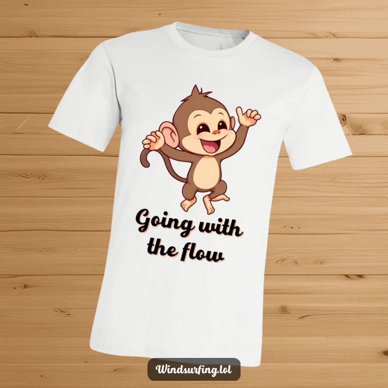 Funny t-shirt featuring a mischievous monkey leaning playfully into a strong wind gust, showcasing its cheeky personality.