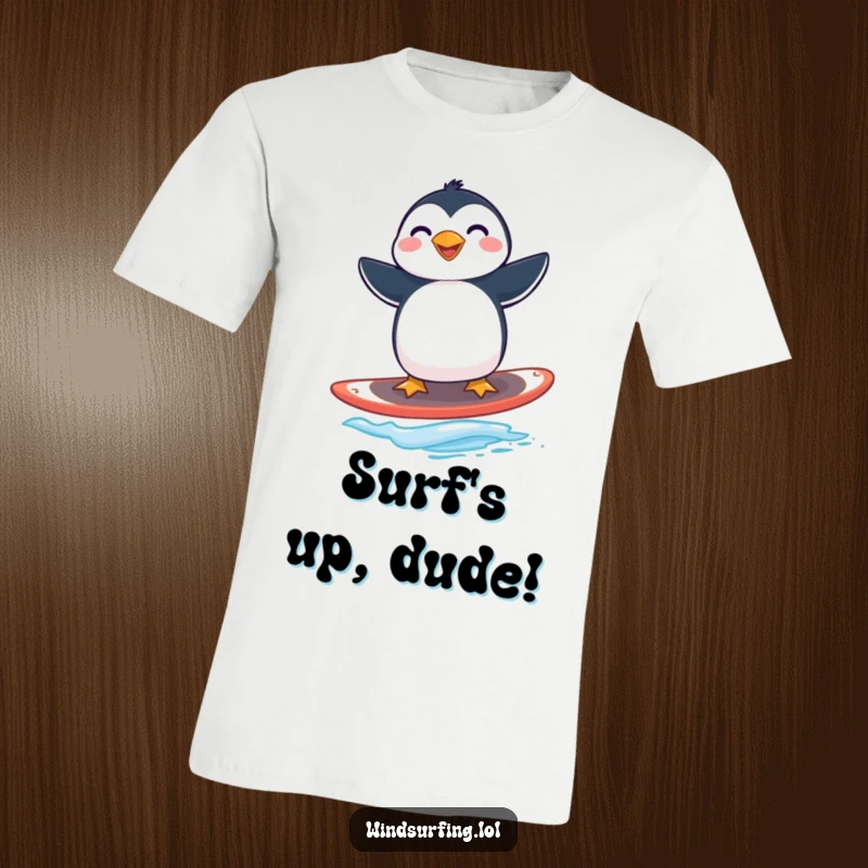 Funny penguin windsurfing t-shirt with a grinning penguin masterfully balancing on a windsurfing board mid-action.