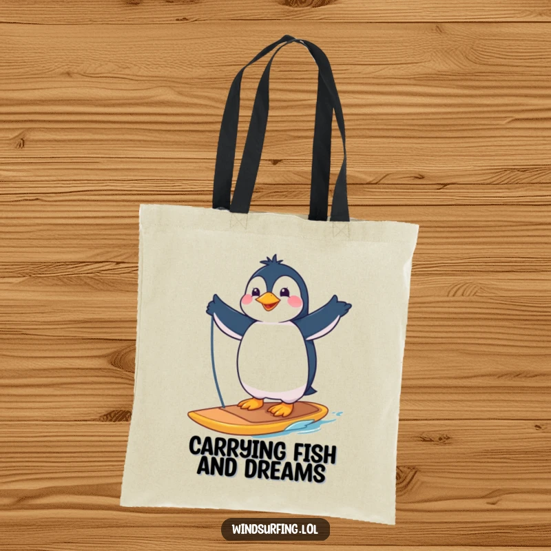 Funny tote bag showcasing a proud penguin striking a pose on a windsurfing board, perfect for carrying essentials with style.
