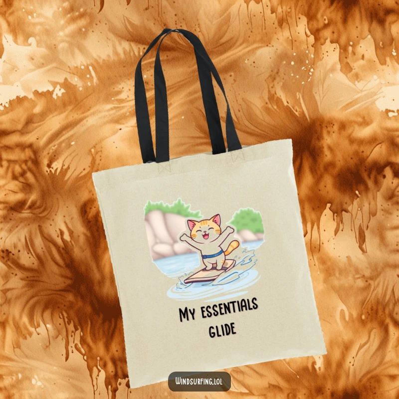Funny tote bag showcasing a joyful cat windsurfing with arms spread wide, a stylish and humorous accessory.