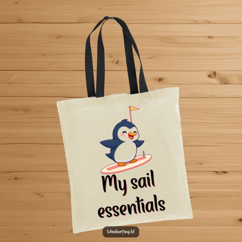 Funny tote bag with a giggling penguin effortlessly gliding on a sailboard, ideal for carrying daily items with arctic flair.